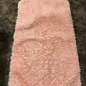 Pink fluffy carpet
